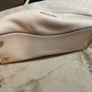 Michael Kors purse and matching wristlet.